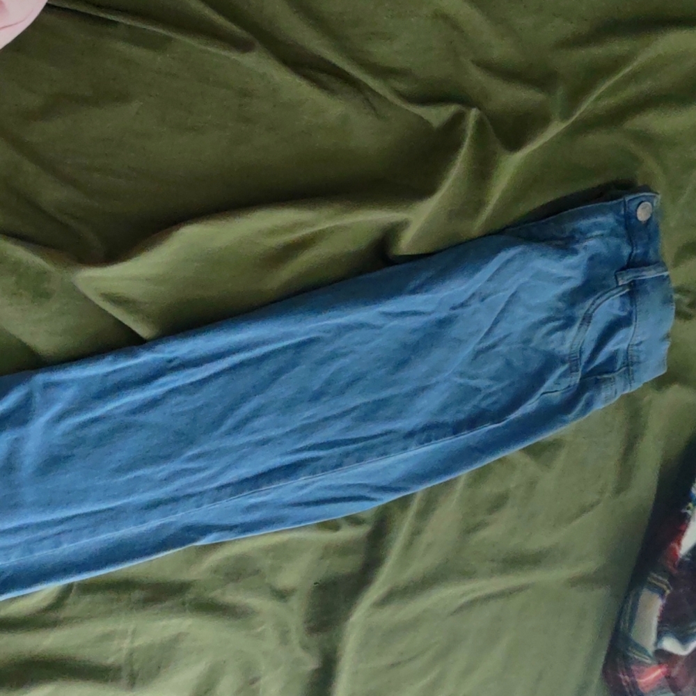 I am selling high rise jeggings that are light blue worn one time and already wa